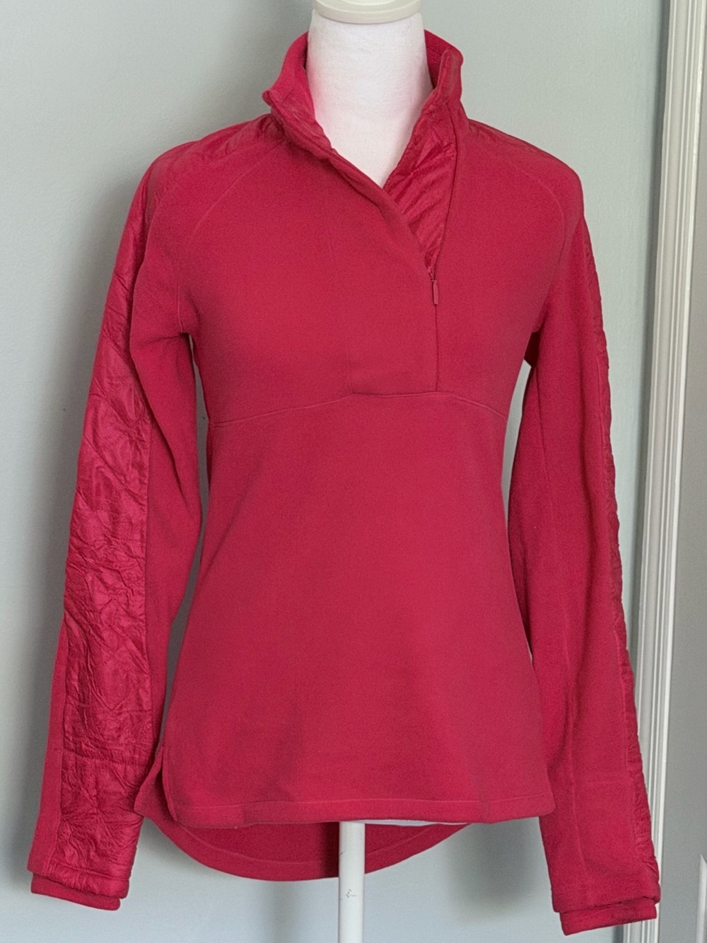 Athleta Vortex Half Zip pullover featuring quilted puffer sleeves